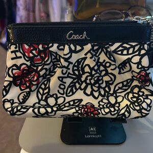 Wristlet Coach with Floral Print